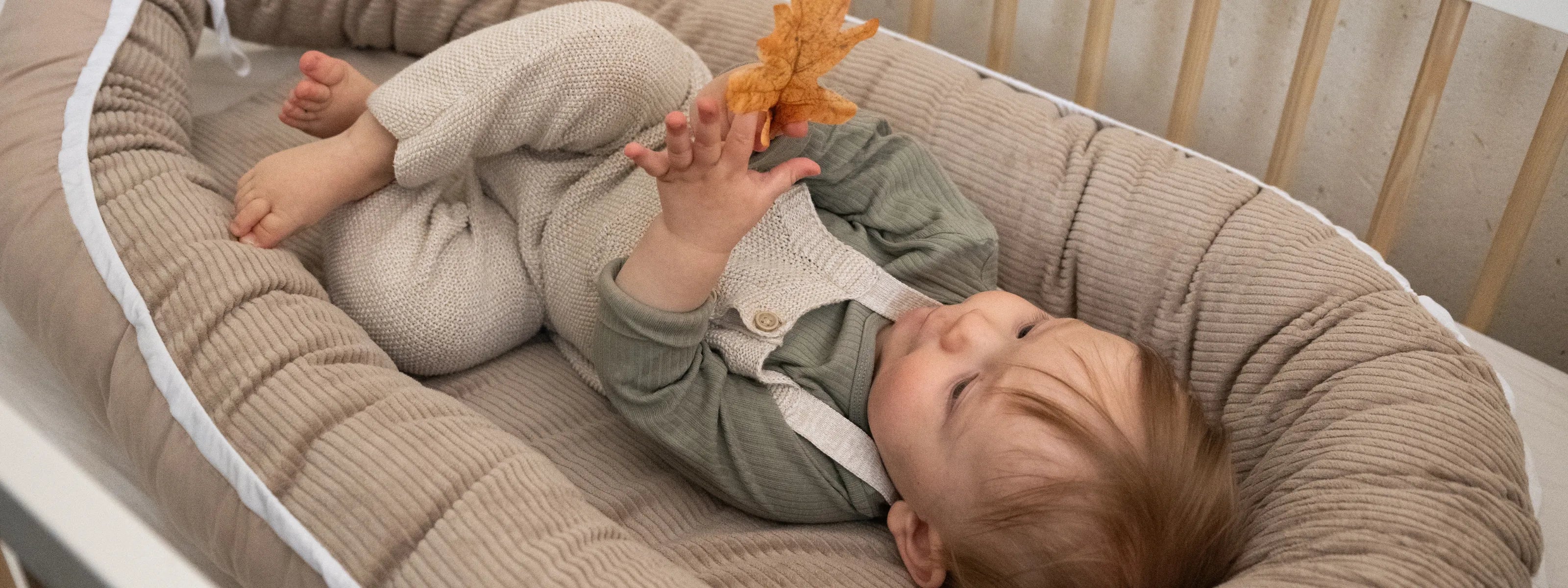 Reisen mit Baby - Wie ein Babynest oder eine Krabbeldecke den Alltag erleichtern-ULLENBOOM Baby