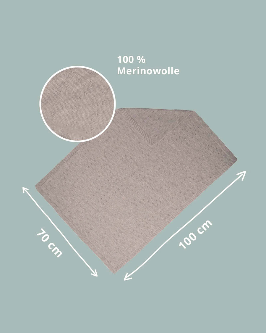 Beige 100% Merino wool baby blanket, 70x100 cm, with subtle knit texture and border.