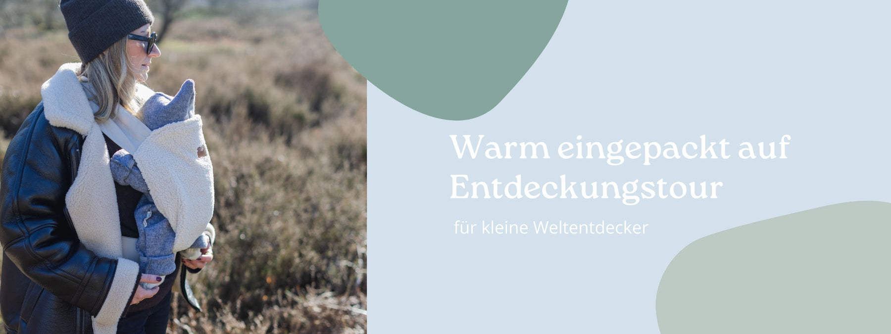 Baby mit Wollwalk Grau in Babytrage - ULLENBOOM